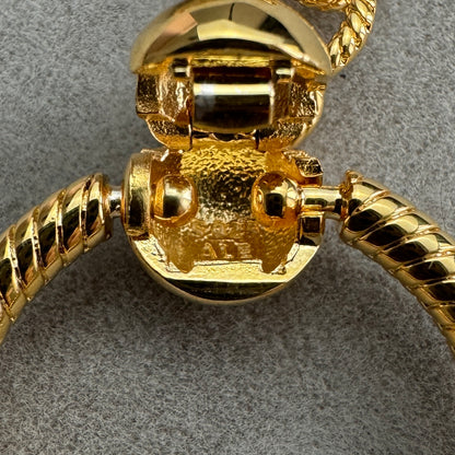 Llavero Baño Dorado