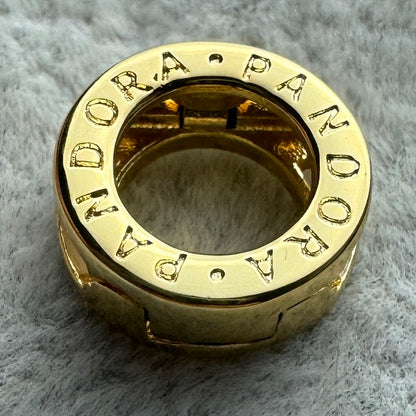 Charm Relfexions Dorado Logotipo