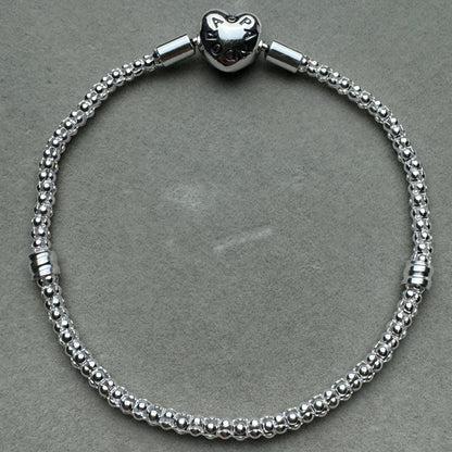 Brazalete Delgado Broche Corazón