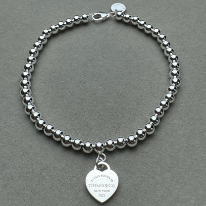Brazalete Bolitas Corazón Azul Tiff