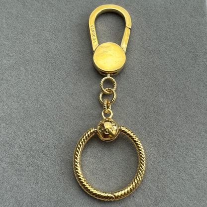 Llavero Baño Dorado