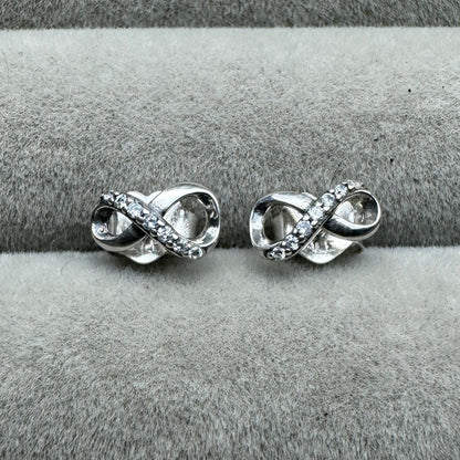 Aretes De Botón Infinito Reluciente