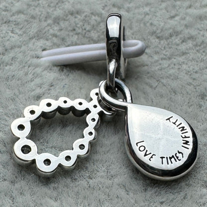 Charm Colgante Doble Infinito